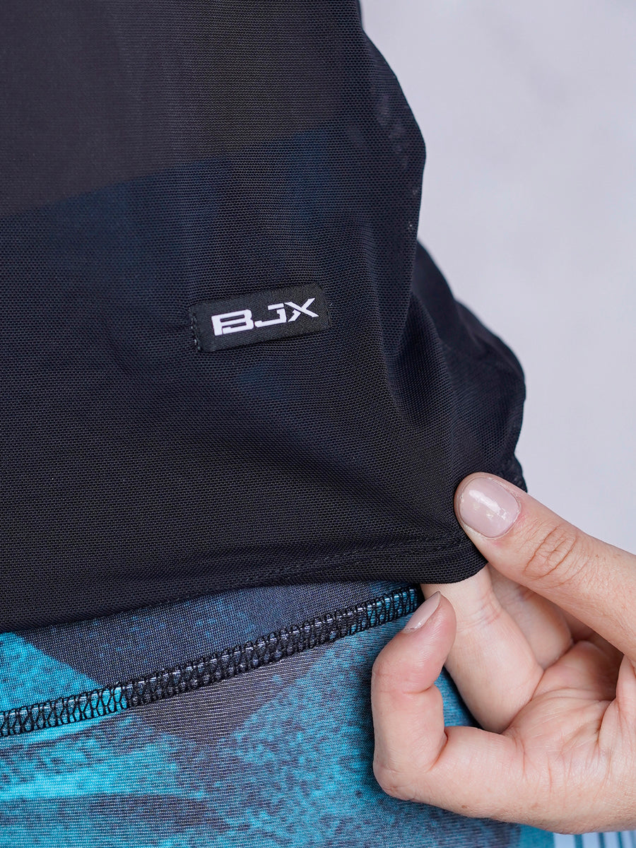 Blusa deportiva para dama en malla/ descuento