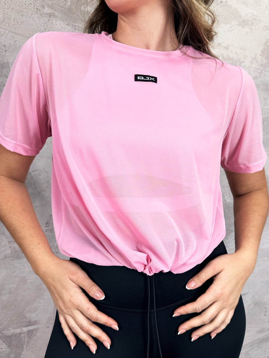 Camiseta deportiva en malla con recogido para dama