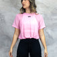 Camiseta deportiva en malla con recogido para dama