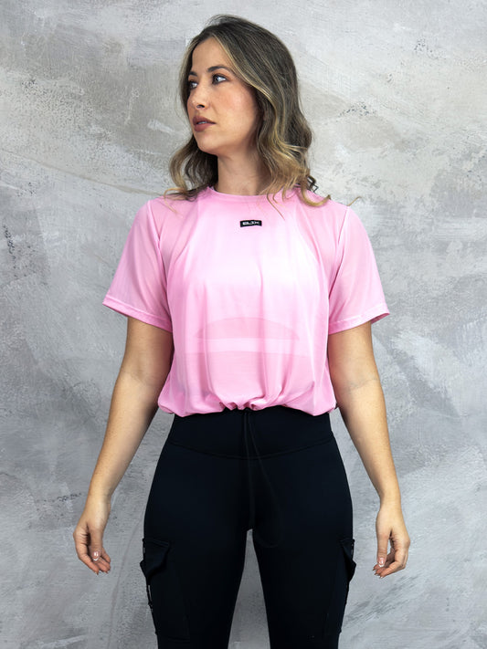 Camiseta deportiva en malla con recogido para dama