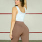 Camiseta deportiva en malla tipo crop top