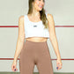 Camiseta deportiva en malla tipo crop top