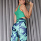 Camiseta deportiva en malla tipo crop top