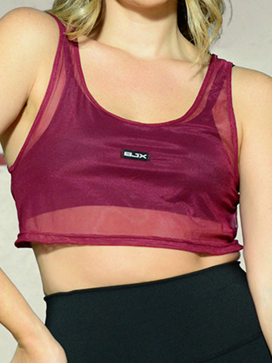 Camiseta deportiva en malla tipo crop top / Descuento